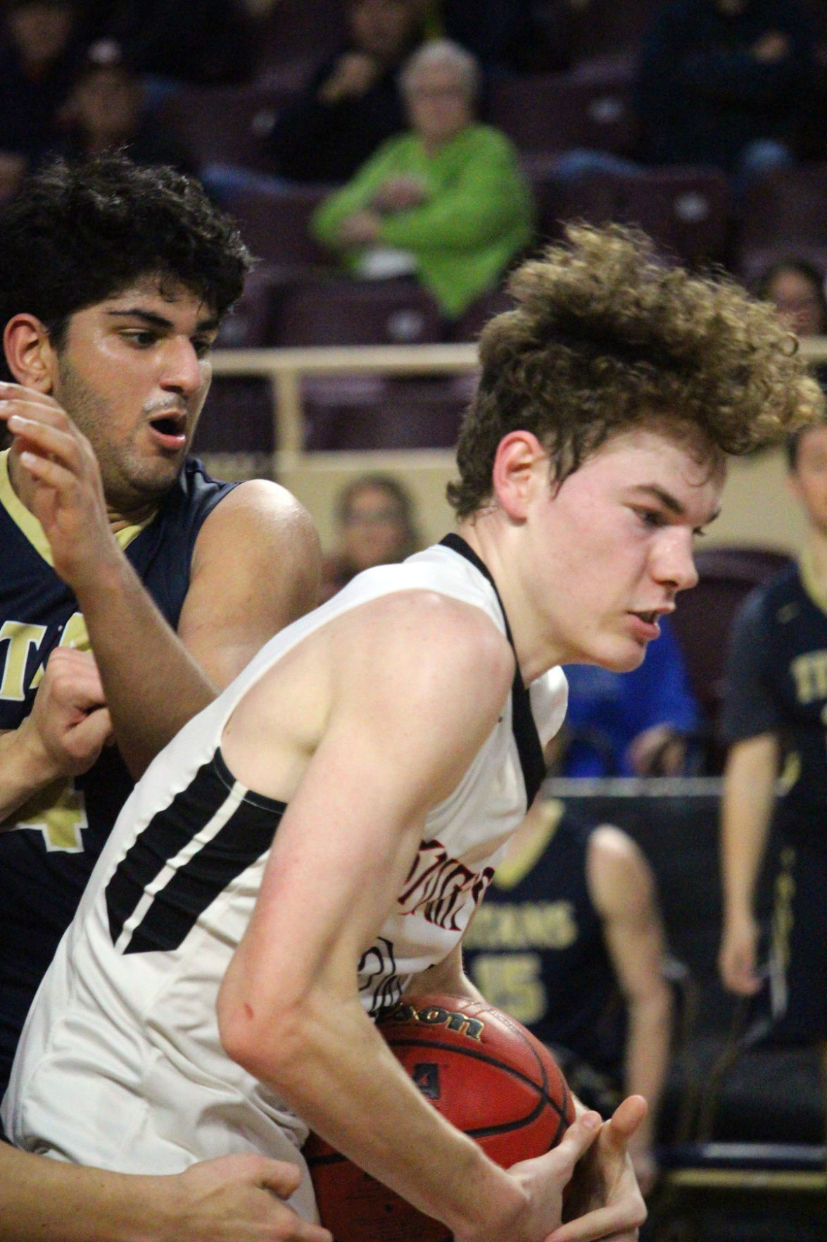 CS24 Parker Huffman secures a rebound in front of HV14 Manu Singh.jpg